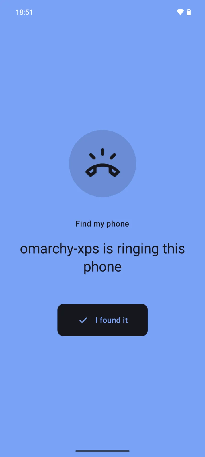The phone shows the text "omarchy-xps is ringing this phone" and an I found it button.